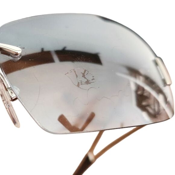 Loewe Anagram Rimless Sunglasses Blue Gradient Lens Silver Frame Logo Arms main image 10